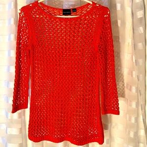 Orange “fishnet” sweater. Tribal brand. Size Small.